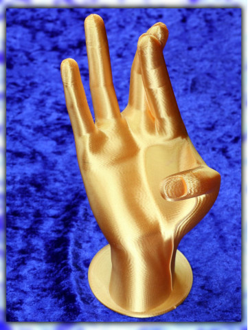 Dekorative Hand in Gold