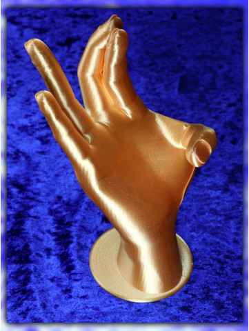 Dekorative Hand in Gold