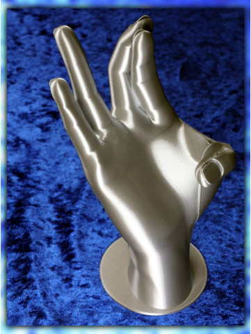 Dekorative Hand in Silber