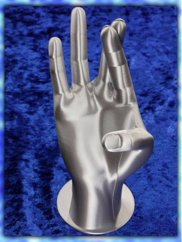 Dekorative Hand in Silber